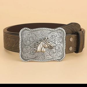New western horse belt buckle and brown belt.
